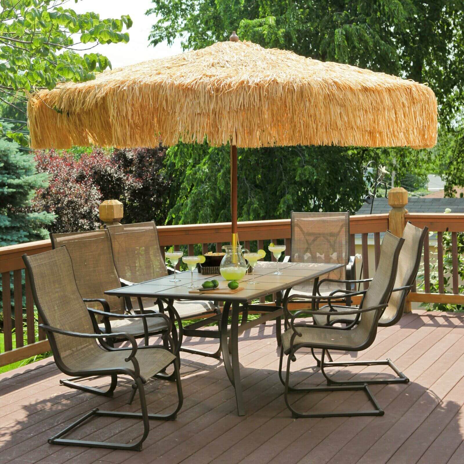 PATIO SET DESIGN IDEAS WITH UMBRELLA AND TROPICAL ATMOSPHERE