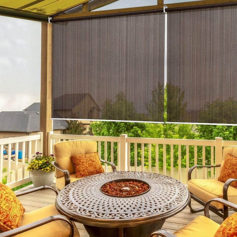 ROLL UP PATIO SHADES TO FILTER THE SUN PORCH AREA
